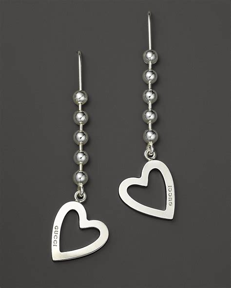 silver gucci interlocking earrings|Gucci sterling silver heart earrings.